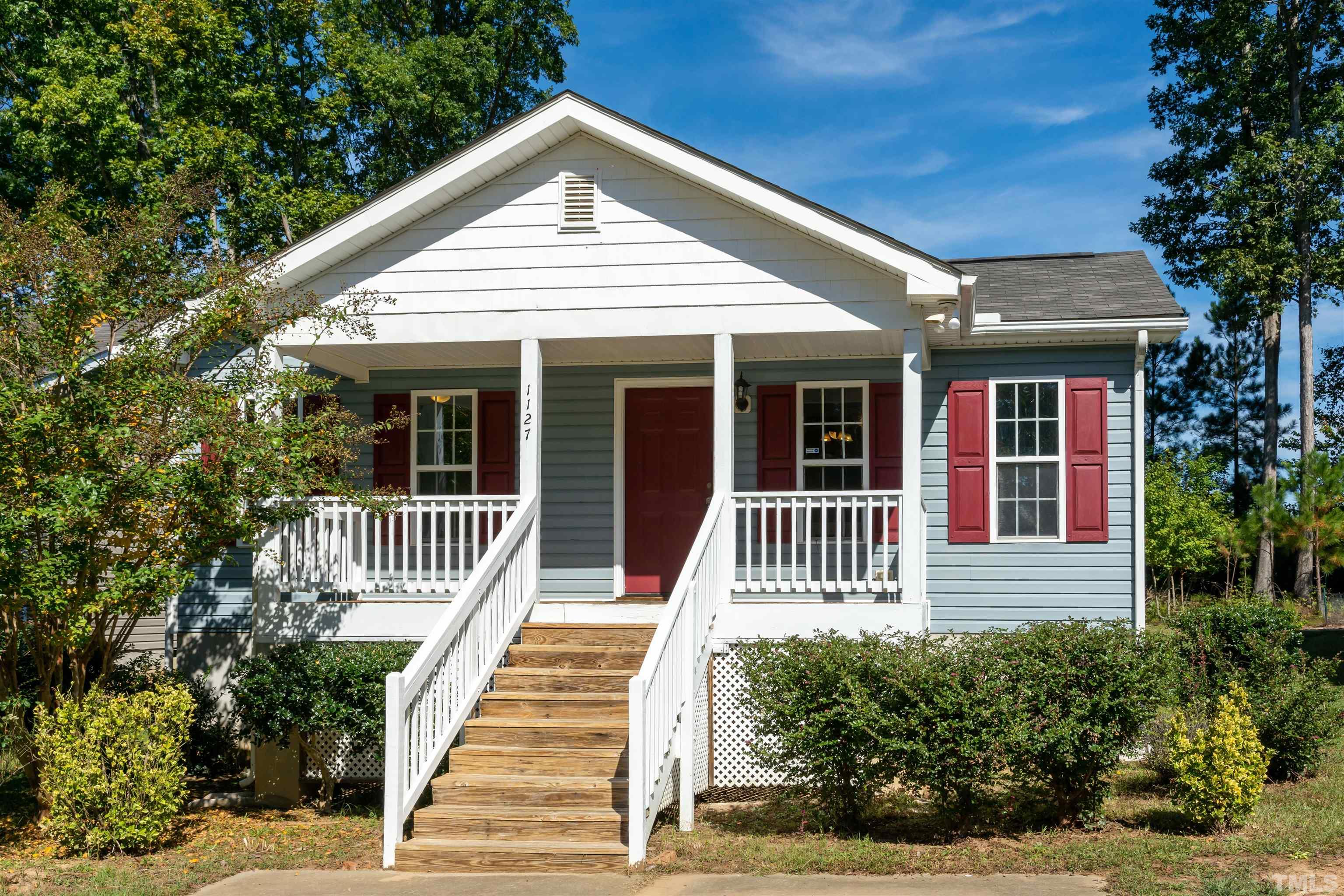 1127 Ricochet Drive Raleigh, NC 27610 - Photo 21 of 21 a view of a house with a porch