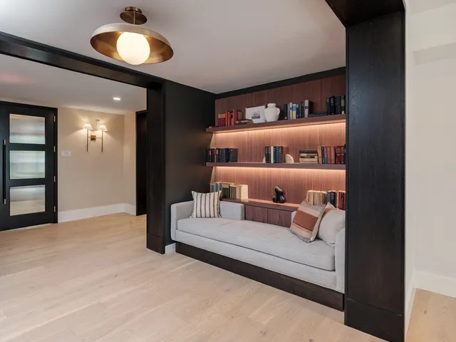 a dining table with chairs and wooden floor