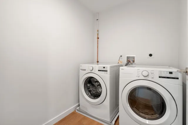 a utility room with dryer and washer