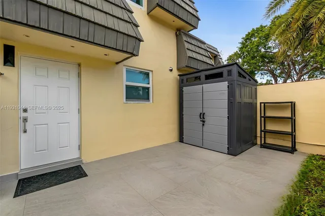 a view of garage and yard
