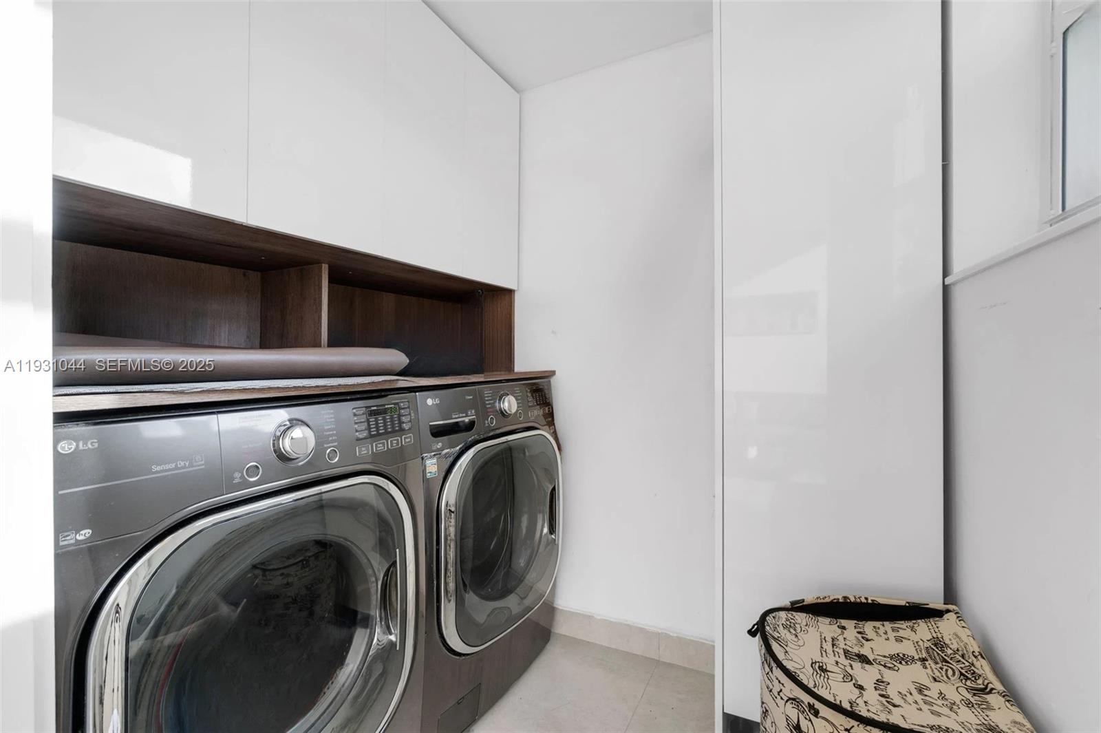 8443 Southwest 137th Avenue, Unit 8443 Miami, FL 33183 - Photo 25 of 29 a utility room with dryer and washer