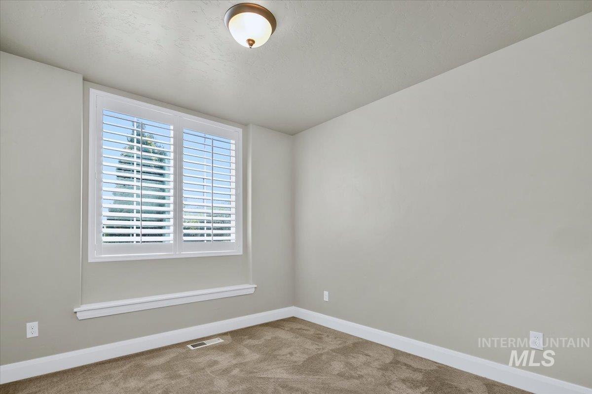 5850 West Rotherham Drive Eagle, ID 83616 - Photo 18 of 50 Main Floor Bedroom
