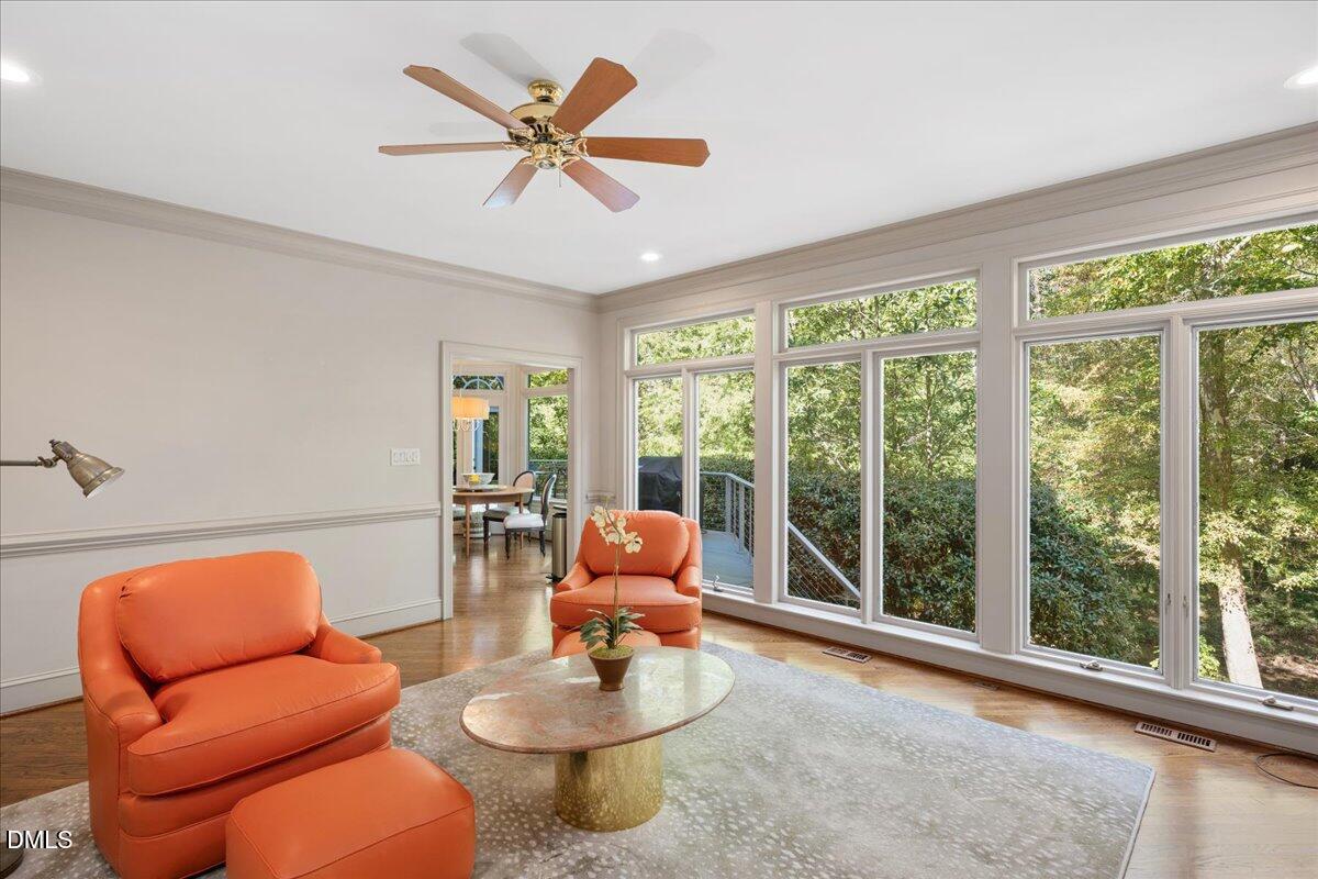 512 Hertford Street Raleigh, NC 27609 - Photo 17 of 39 a living room with furniture and a large window