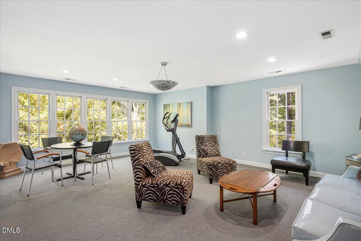 512 Hertford Street Raleigh, NC 27609 - Photo 26 of 39 a living room with furniture and a large window