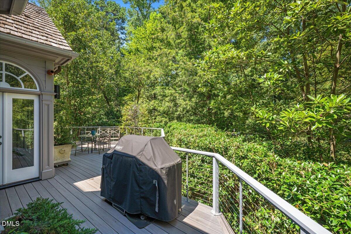 512 Hertford Street Raleigh, NC 27609 - Photo 30 of 39 a view of a wooden deck and a yard
