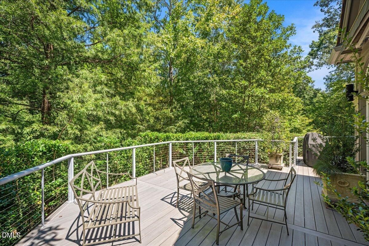 512 Hertford Street Raleigh, NC 27609 - Photo 31 of 39 a view of a chair and table on the deck