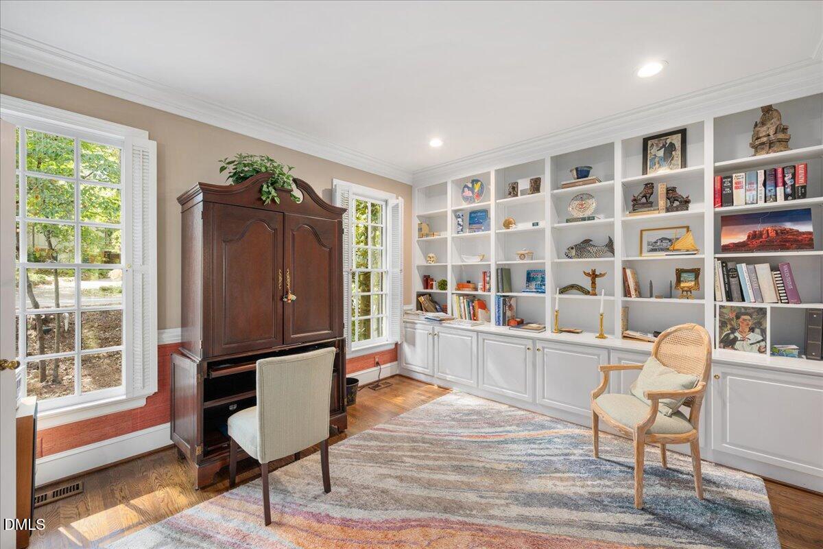 512 Hertford Street Raleigh, NC 27609 - Photo 4 of 39 a view of a workspace with furniture and a window