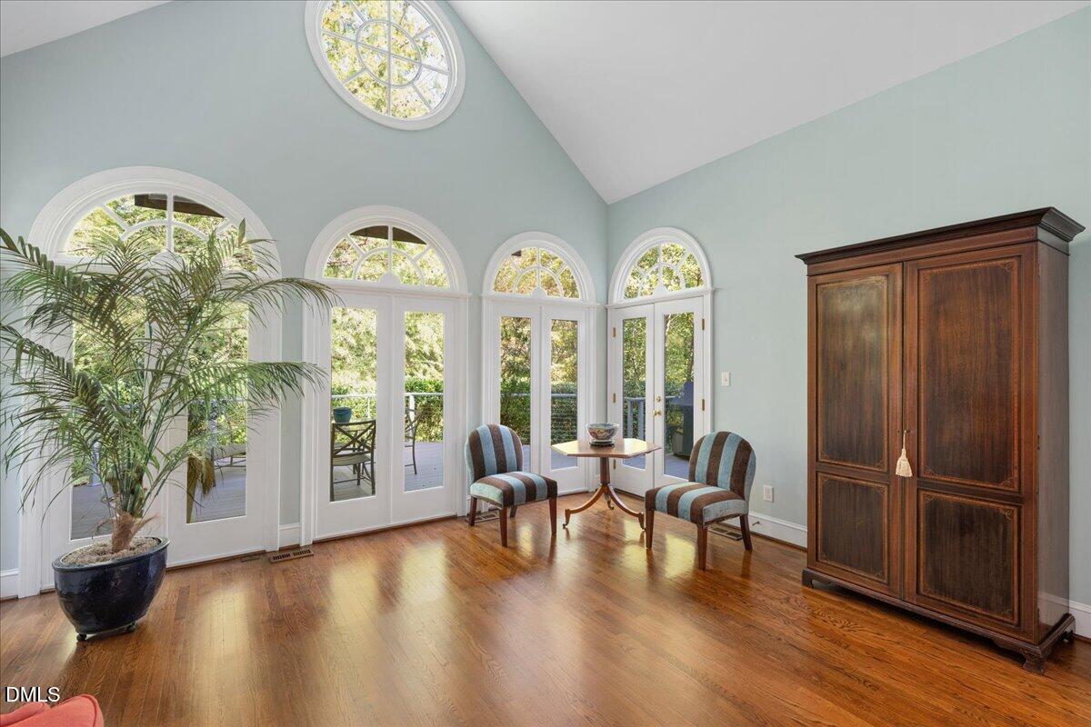 512 Hertford Street Raleigh, NC 27609 - Photo 8 of 39 a view of hall with furniture and wooden floor