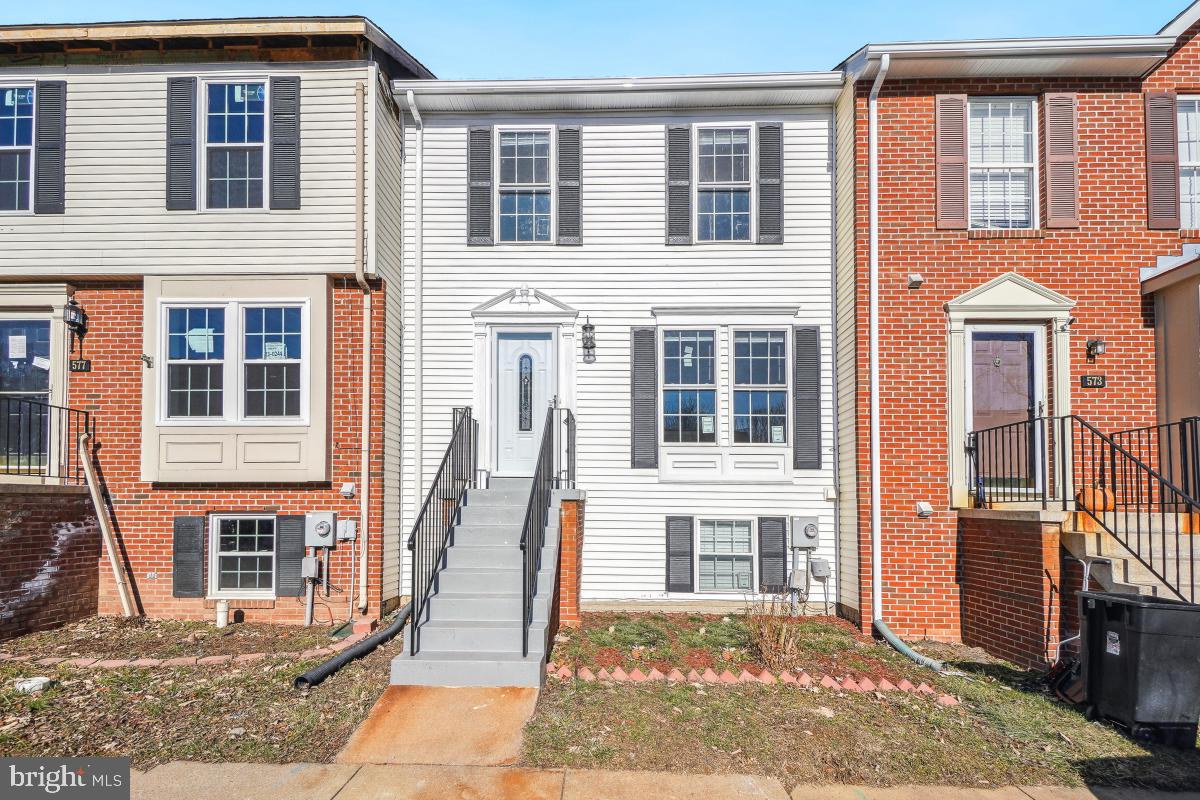 575 Primus Court Frederick, MD 21703 - Photo 1 of 31 a front view of a house with many windows