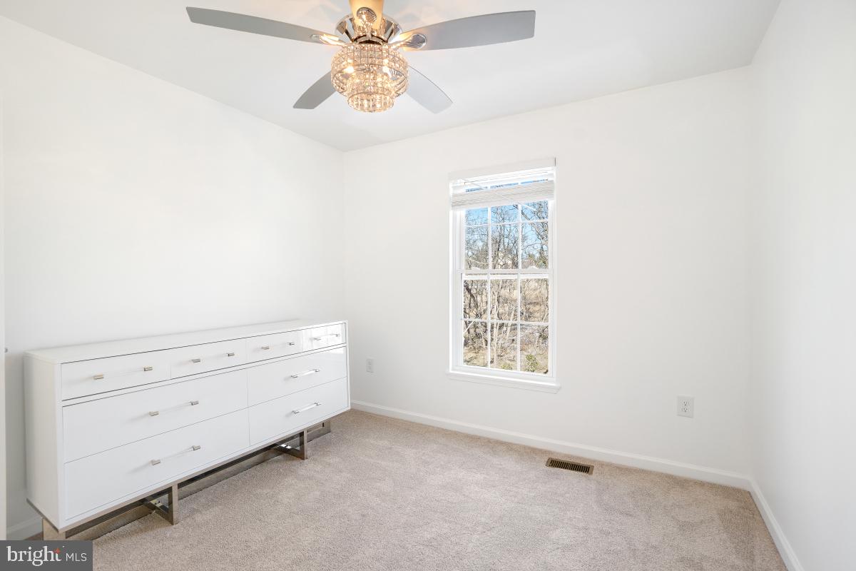 575 Primus Court Frederick, MD 21703 - Photo 12 of 31 an empty room with windows