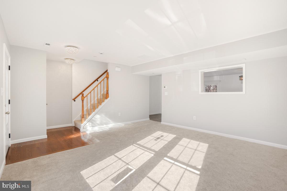 575 Primus Court Frederick, MD 21703 - Photo 23 of 31 a view of entryway and hall with wooden floor