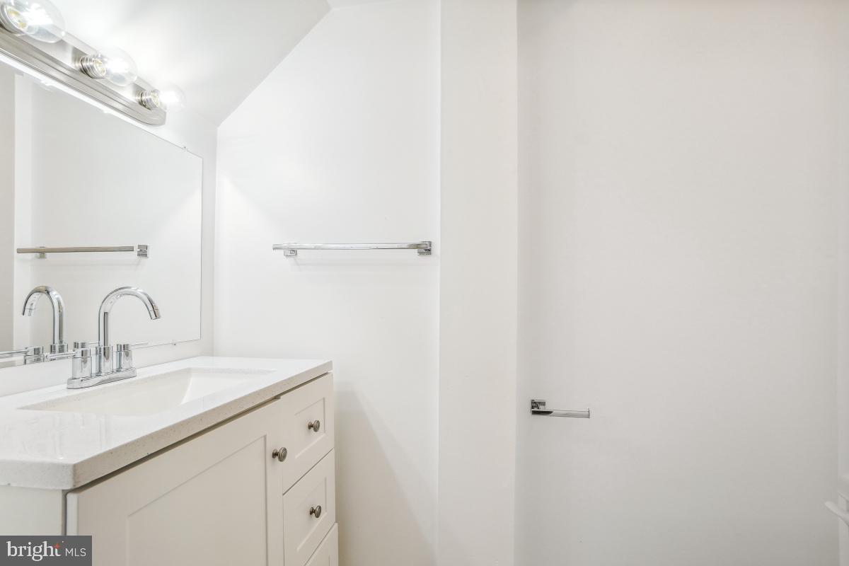 575 Primus Court Frederick, MD 21703 - Photo 10 of 31 a bathroom with a sink and a mirror