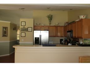 2513 Southern Melbourne, FL 32901 - Photo 7 of 12 a view of kitchen with stainless steel appliances granite countertop a refrigerator and a stove