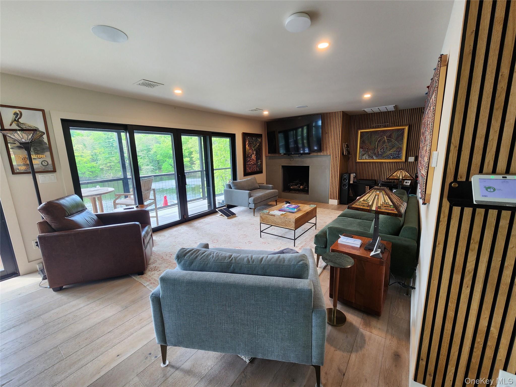 53 Lake Pleasant Road Staatsburg, NY 12580 - Photo 13 of 34 a living room with furniture and a flat screen tv