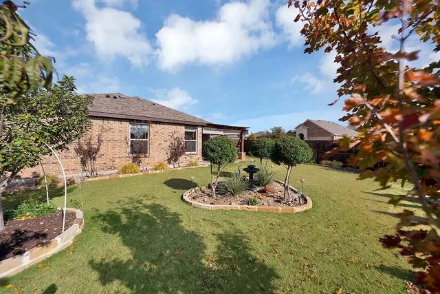 a view of a table and chairs in patio