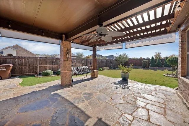 a view of a swimming pool with a porch