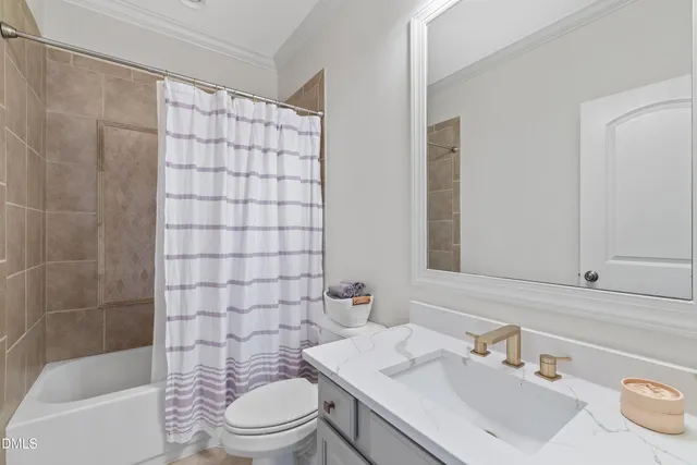 a kitchen with stainless steel appliances granite countertop a sink a stove and a wooden cabinets