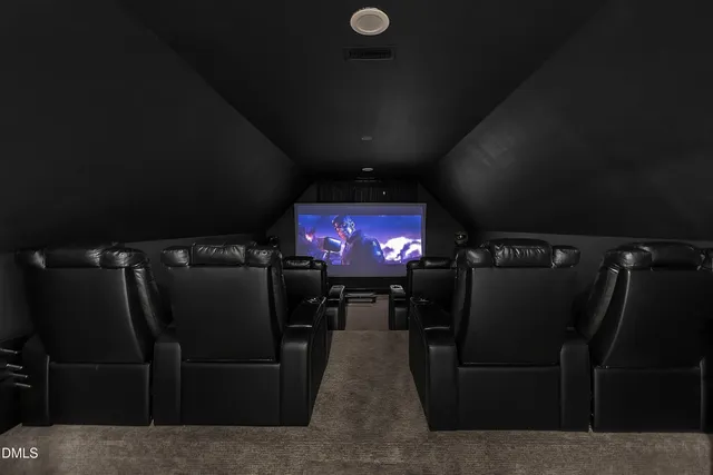 an aerial view of residential house with outdoor space and parking