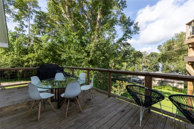 a view of a roof deck with couches