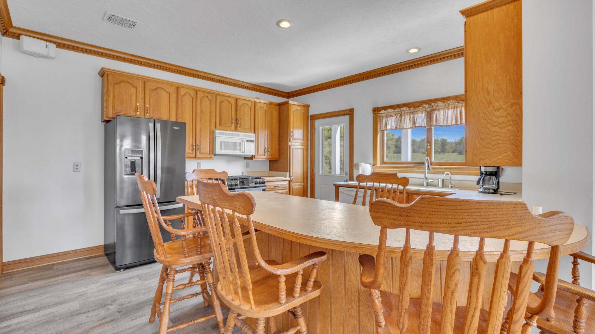 W7034 Parnell Road Mitchell, WI 53073 - Photo 12 of 33 Kitchen with Breakfast Bar