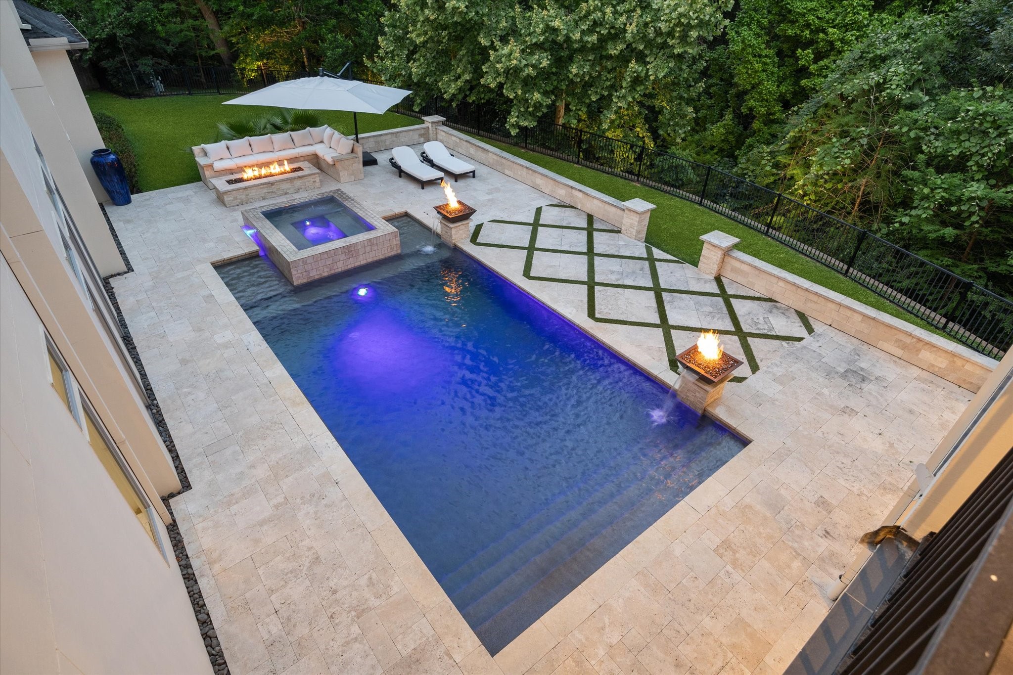 22 East Shady Lane, Unit E Houston, TX 77063 - Photo 3 of 50 Experience ultimate relaxation in this luxurious outdoor oasis.