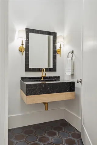 a utility room with cabinets washer and dryer
