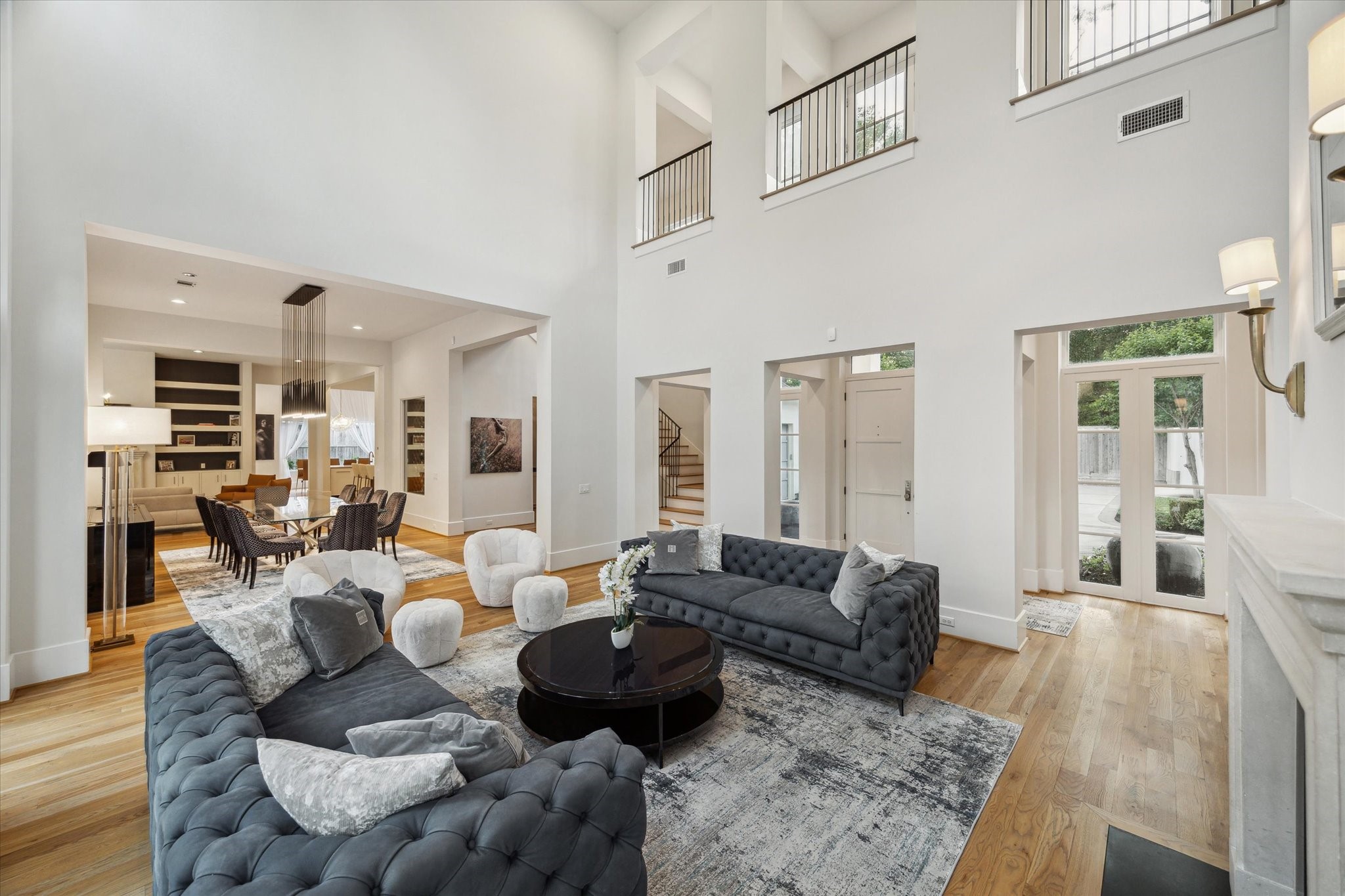 22 East Shady Lane, Unit E Houston, TX 77063 - Photo 50 of 50 he open floor plan seamlessly connects to the dining area, creating an ideal setting for entertaining.