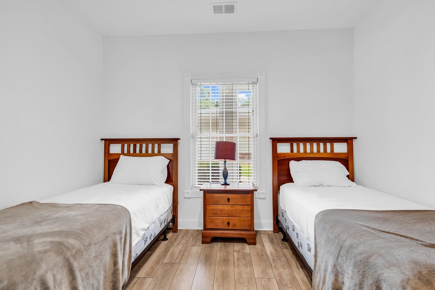4801 Luster Leaf Circle, Unit 104 Myrtle Beach, SC 29577 - Photo 13 of 37 Bedroom featuring light wood-type flooring