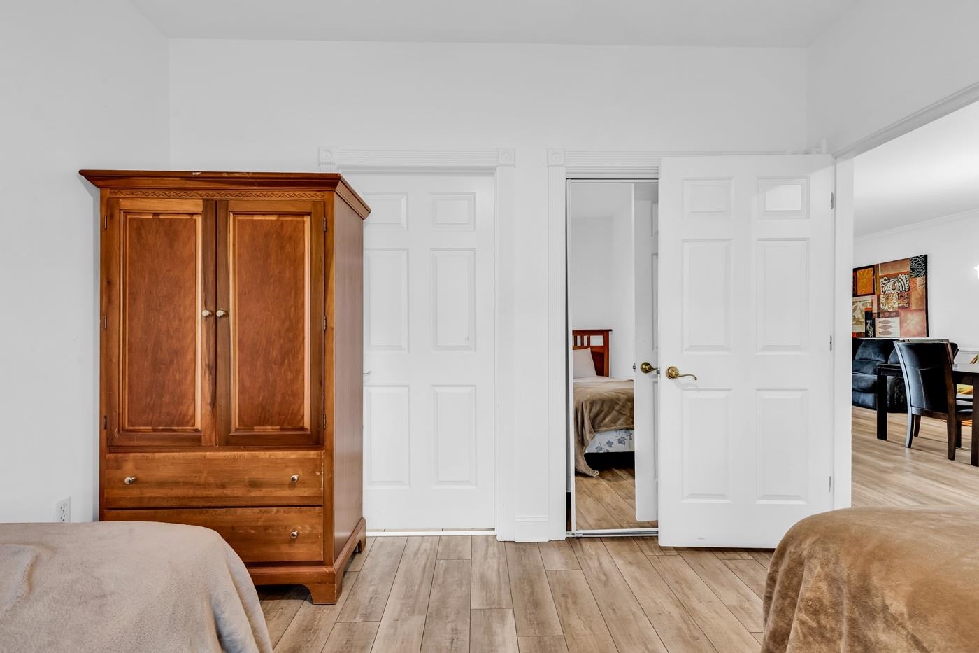 4801 Luster Leaf Circle, Unit 104 Myrtle Beach, SC 29577 - Photo 14 of 37 Bedroom featuring light wood-style floors