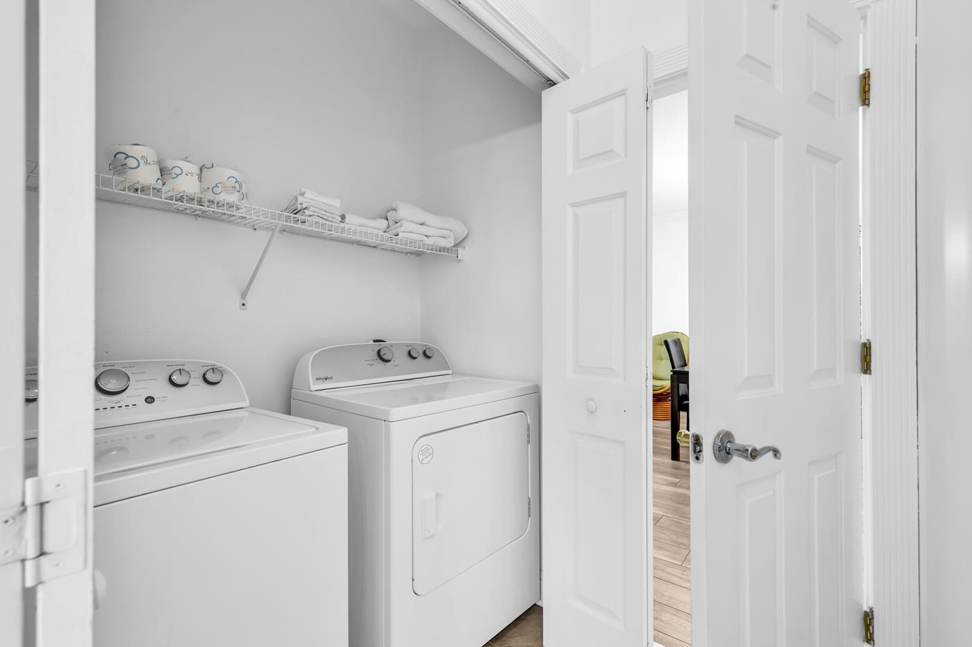 4801 Luster Leaf Circle, Unit 104 Myrtle Beach, SC 29577 - Photo 17 of 37 Laundry room with washer and dryer