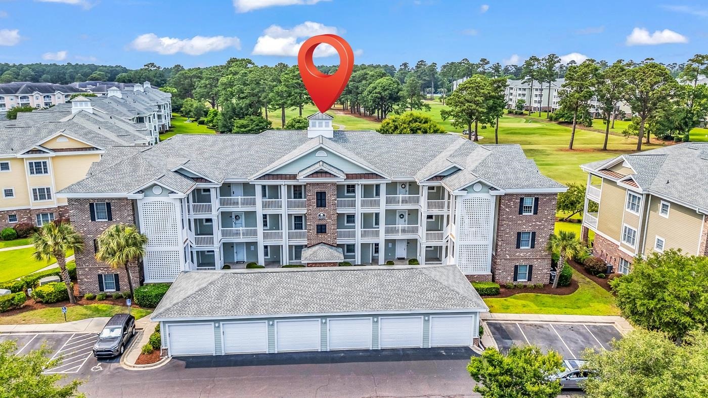 4801 Luster Leaf Circle, Unit 104 Myrtle Beach, SC 29577 - Photo 26 of 37 Drone / aerial view of apartment complex