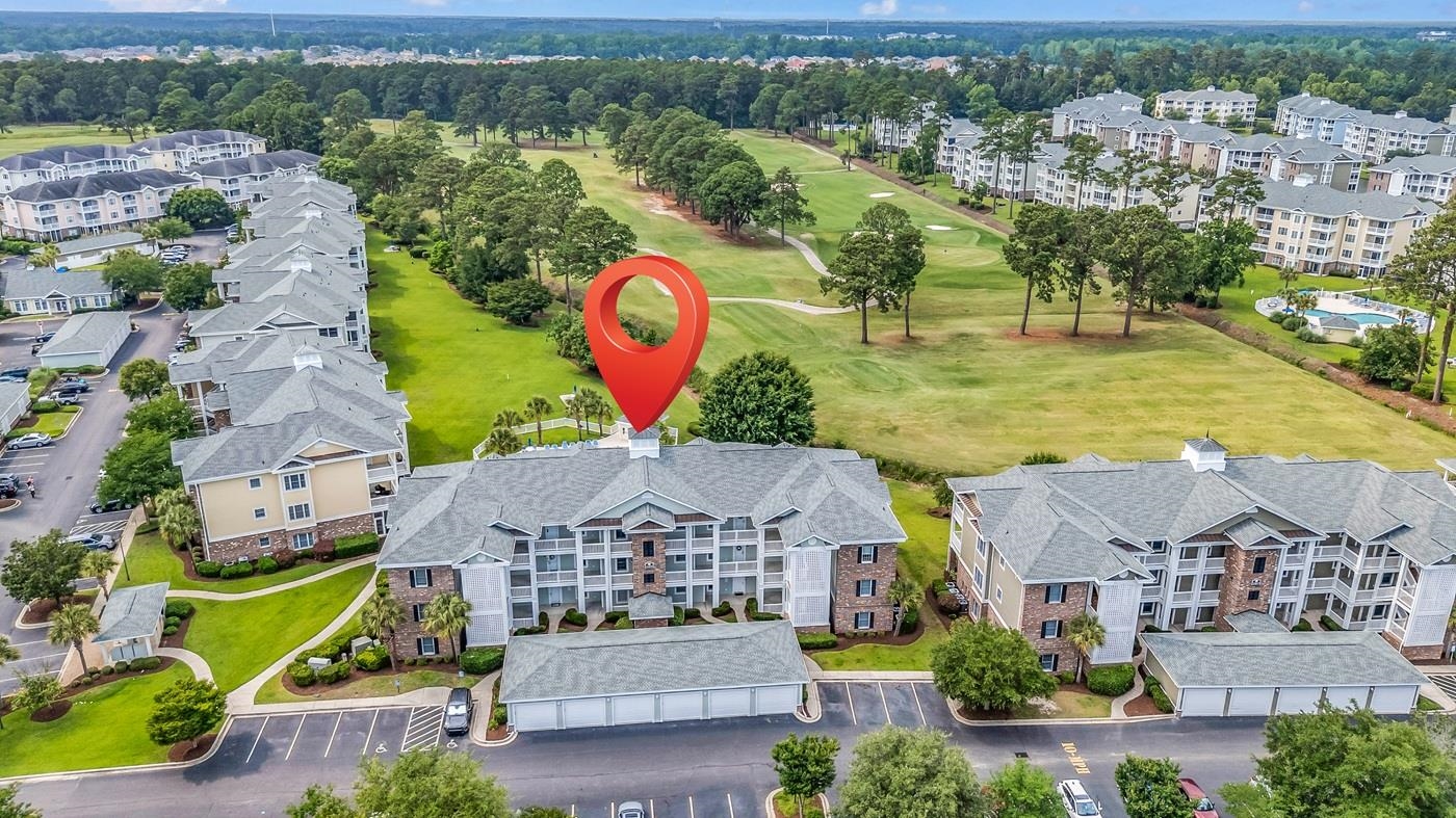 4801 Luster Leaf Circle, Unit 104 Myrtle Beach, SC 29577 - Photo 27 of 37 Bird's eye view of apartment complex / building and a golf course