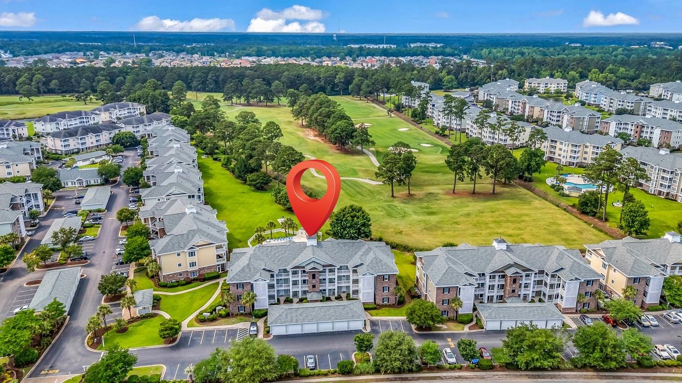 4801 Luster Leaf Circle, Unit 104 Myrtle Beach, SC 29577 - Photo 28 of 37 Bird's eye view of a golf course