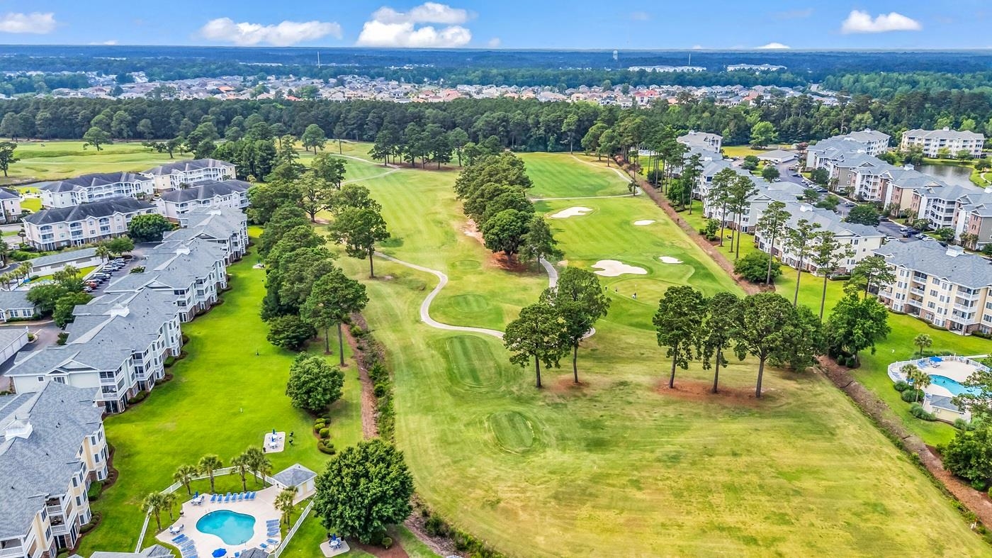 4801 Luster Leaf Circle, Unit 104 Myrtle Beach, SC 29577 - Photo 31 of 37 View of property location featuring a pool area and a golf club