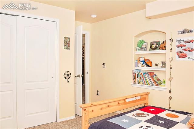654 Struthers Ranch Road Colorado Springs, CO 80921 - Photo 22 of 35 two more large bedrooms in basement.