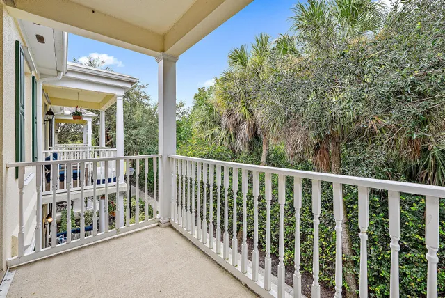 a view of a balcony with an outdoor space