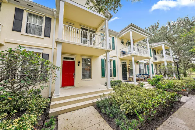 a front view of a multi story residential apartment building