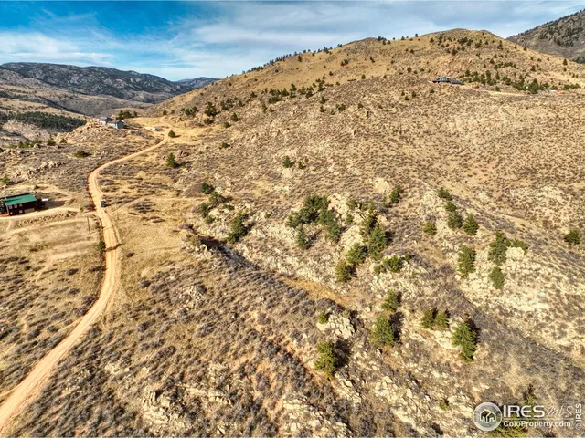 a view of ocean and a mountain