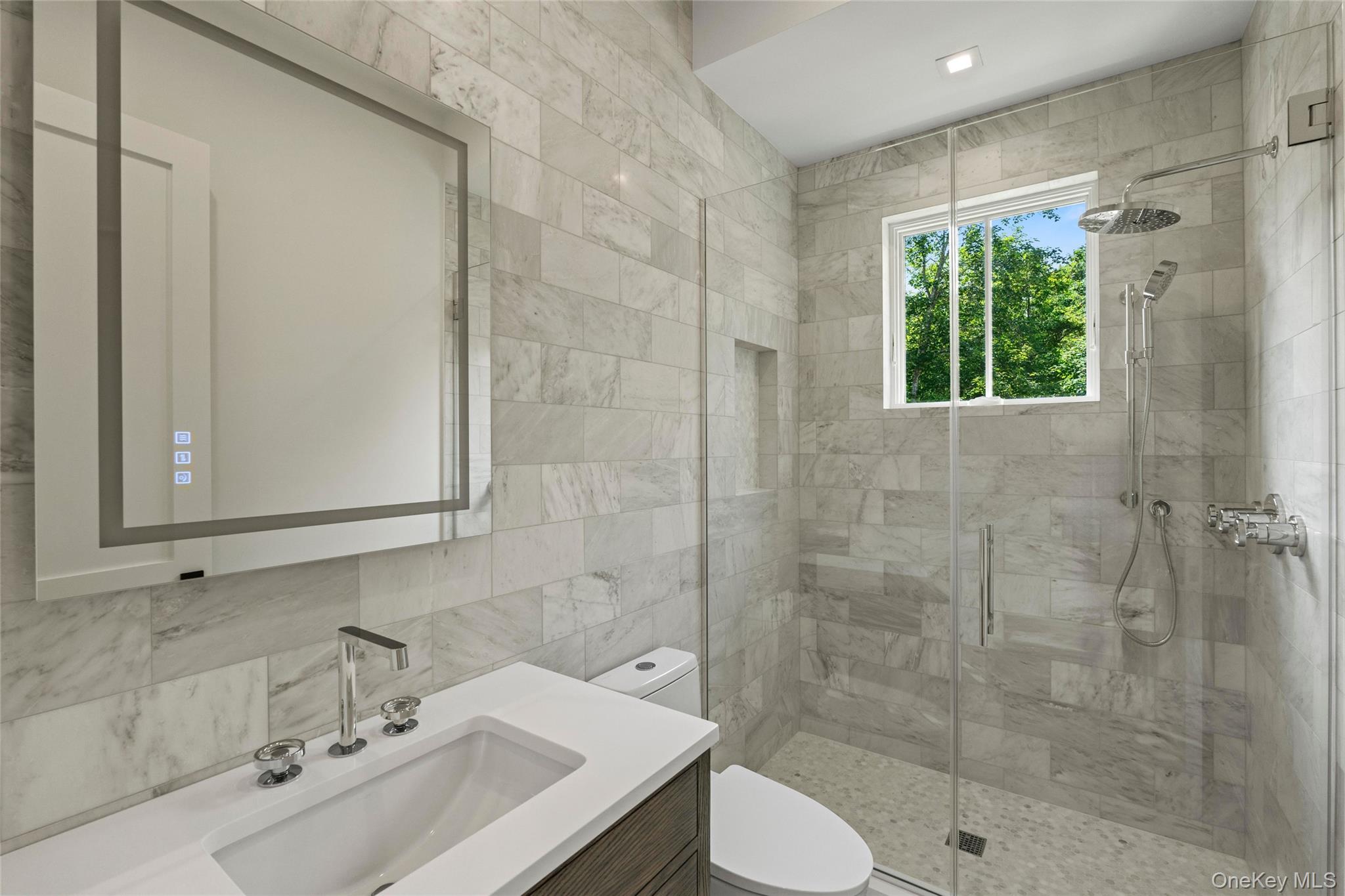 161 South Road Westhampton, NY 11977 - Photo 20 of 34 a bathroom with a sink a toilet and shower