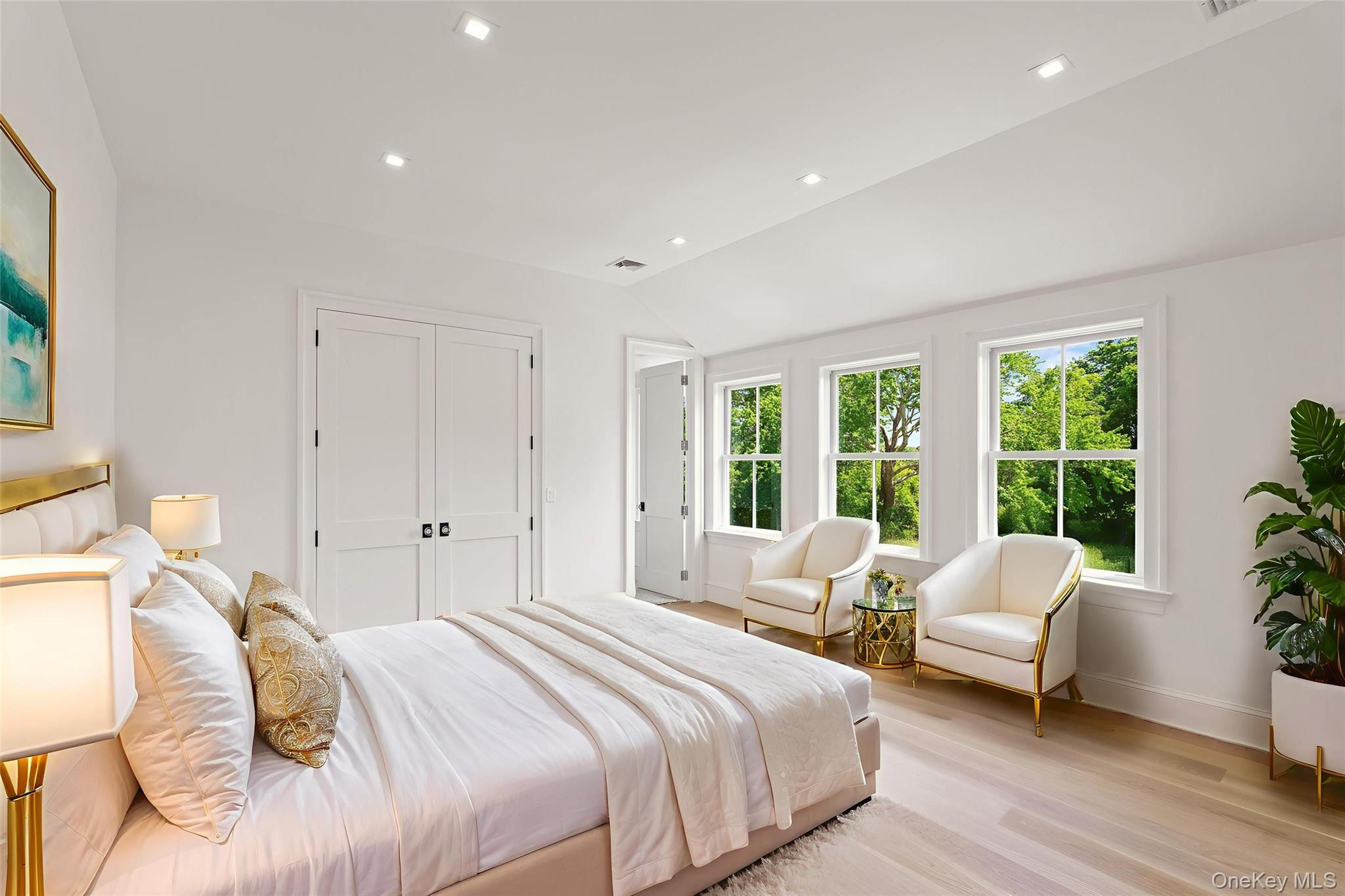 161 South Road Westhampton, NY 11977 - Photo 24 of 34 Bedroom featuring vaulted ceiling, light wood-style flooring, recessed lighting, and a closet