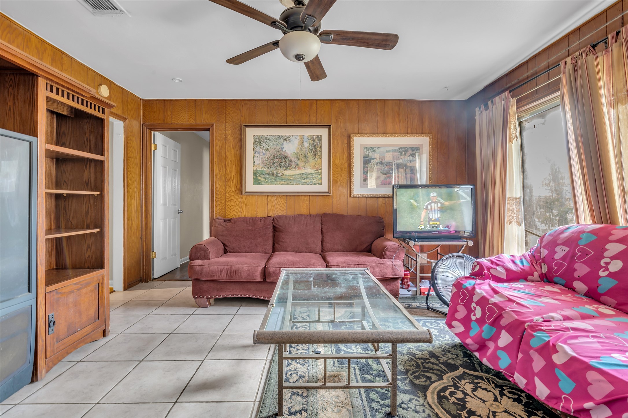 4903 Connorvale Road Houston, TX 77039 - Photo 12 of 28 a living room with furniture and a window