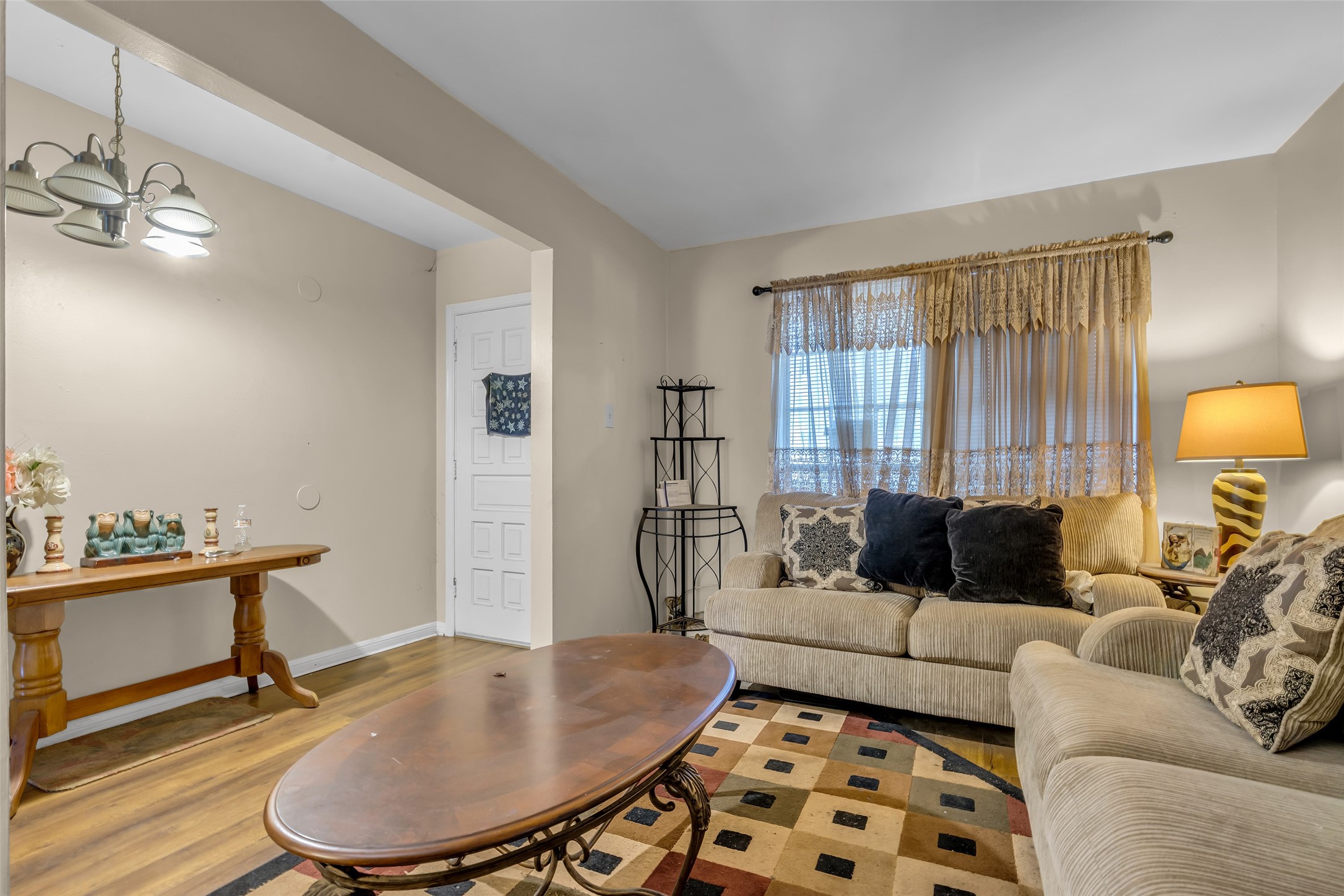 4903 Connorvale Road Houston, TX 77039 - Photo 9 of 28 a living room with furniture and a lamp