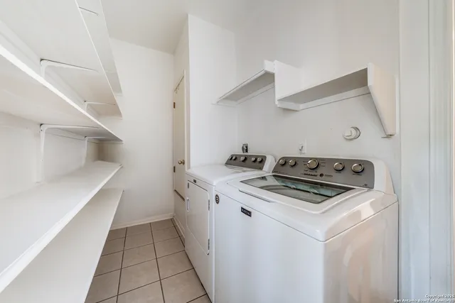 a kitchen with a stove and a sink