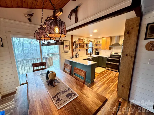 a view of a livingroom with furniture and wooden floor