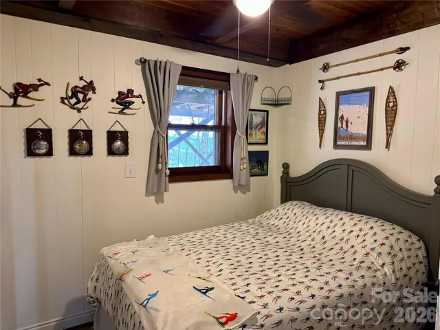 a view of a dinning table and chairs on the roof deck