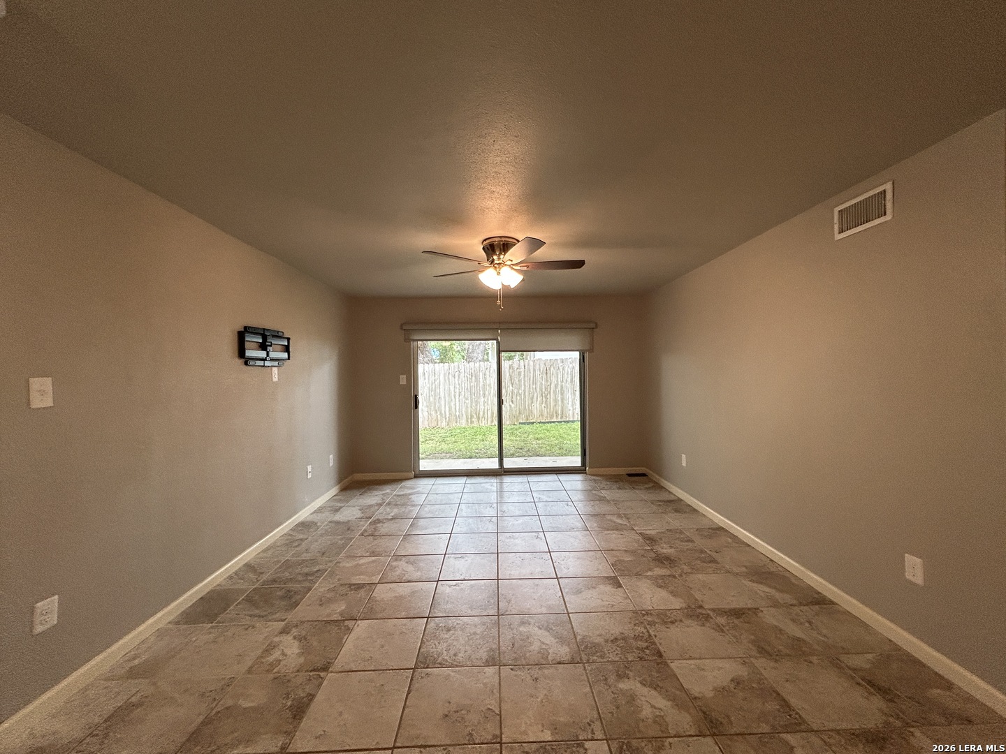 551 Terminal Loop Road, Unit D5 McQueeney, TX 78123 - Photo 2 of 42 a view of an empty room with a window