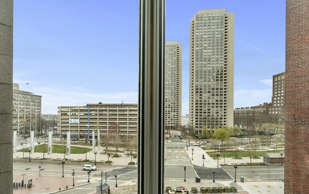 80 Broad Street, Unit 604 Boston, MA 02110 - Photo 16 of 21 a view of a city with tall buildings