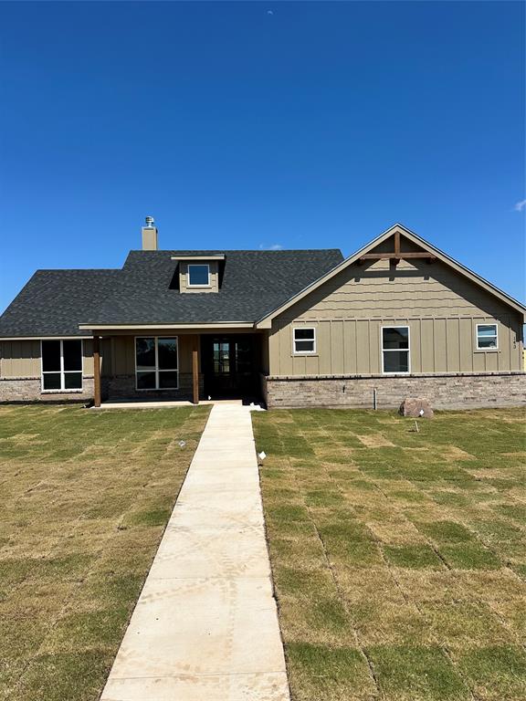 143 Ridge Road Tuscola, TX 79562 - Photo 1 of 24 a front view of a house with glass windows