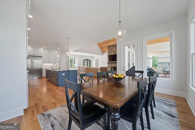 a bedroom with a large bed and a flat screen tv