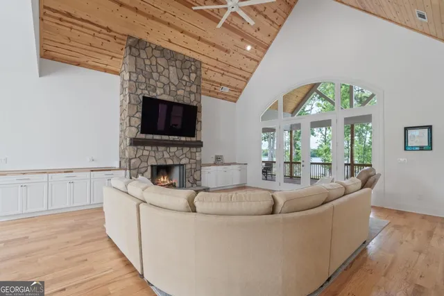 a large kitchen with stainless steel appliances kitchen island granite countertop a large counter top and stainless steel appliances